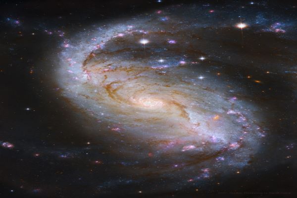 کهکشان مارپیچی میله ای NGC 1672