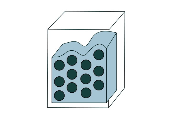 ذرات گرد سبز داخل یک سیال درون یک جعبه