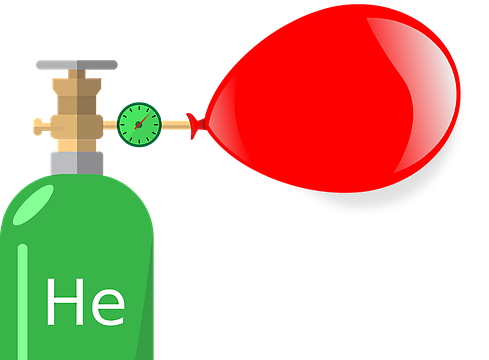 یک کپسول گازی به رنگ سبز حاوی گاز He به یک بادکنک قرمز متصل شده است.