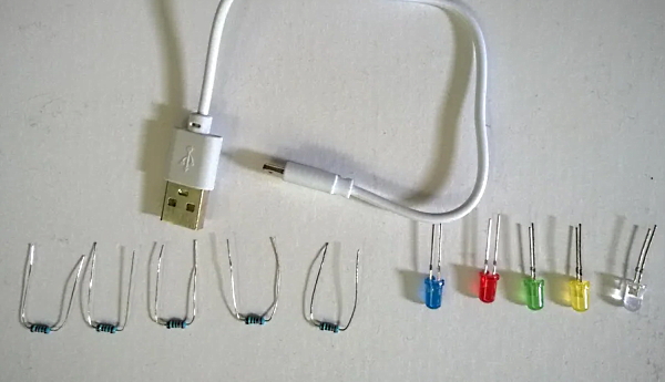 تصویری از چند LED رنگی و مقاومت و کابل USB