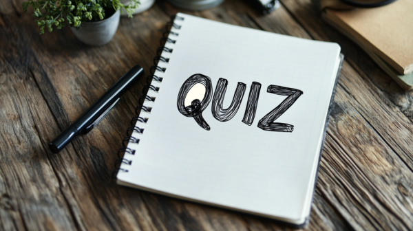 تصویر دفتری که روی آن نوشته شده Quiz